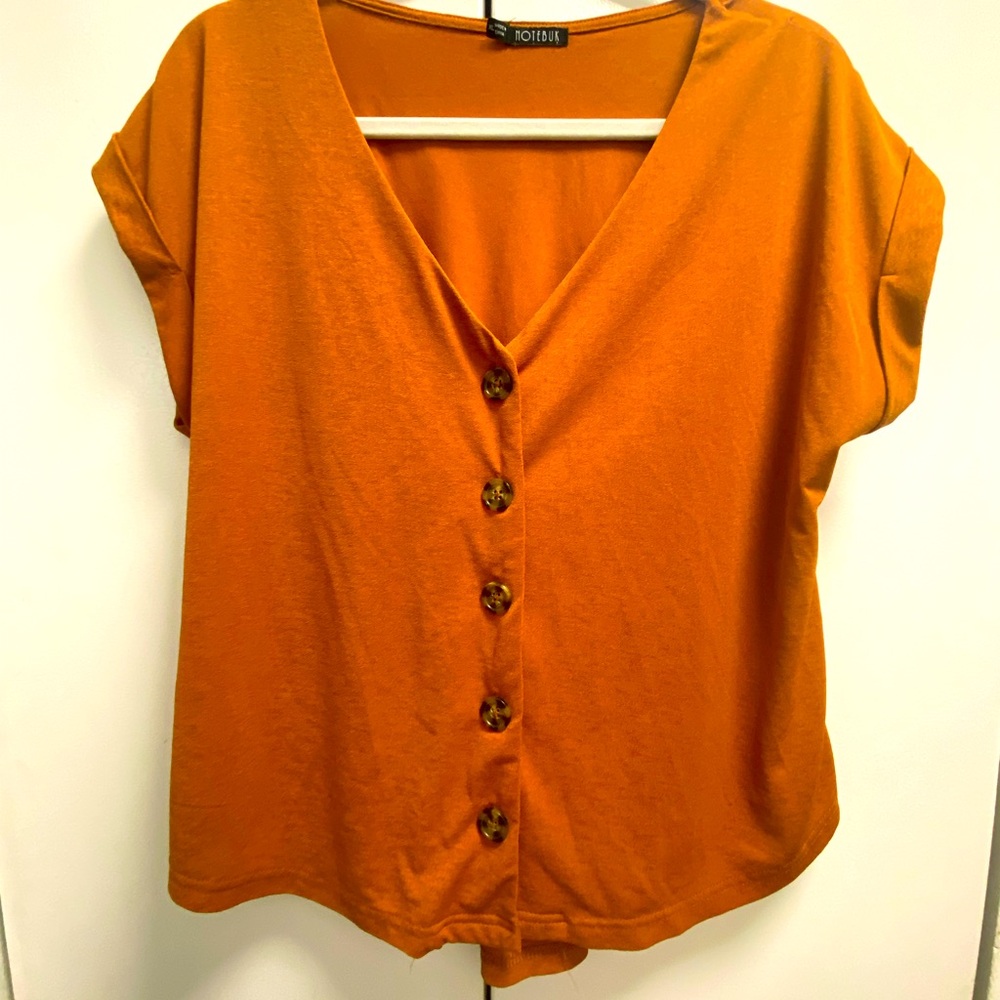 Orange button down top